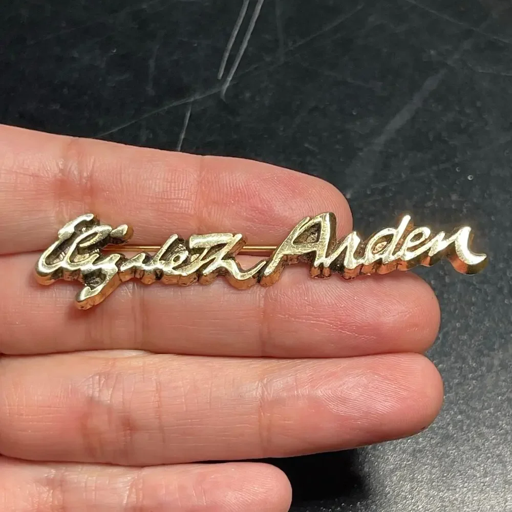 Vintage Elizabeth Arden Gold Tone Consultant Brooch Pin 2.75
